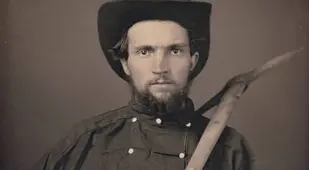 Man Holding Gold