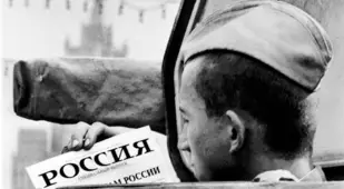 Man Holding Anti-Coup Leaflet