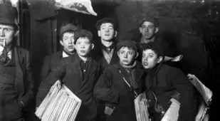 Group Of Newsboys Holding Papers
