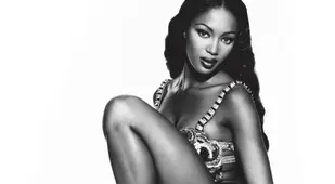 Naomi Campbell On A Leopard Tablecloth