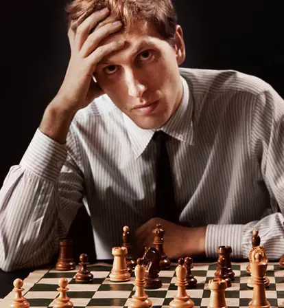 Bobby Fischer Sitting At A Chess Board