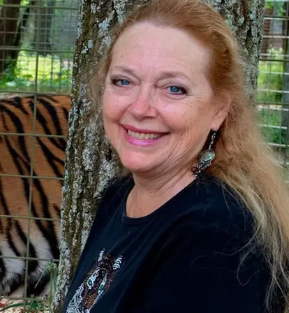 Carole Baskin Smiling With A Tiger