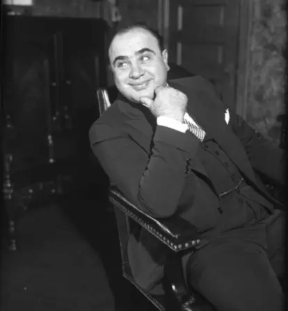 Al Capone Smiling In His Seat