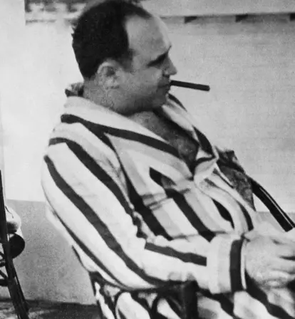 Al Capone Smoking And Sitting