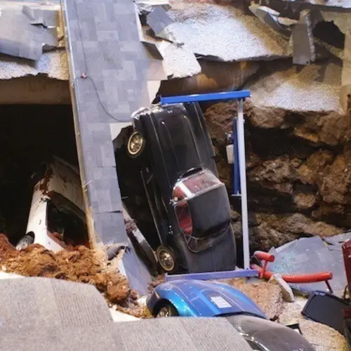 17 Amazing Pictures Of The Sinkhole That Ate $5 Million Worth Of Classic Cars