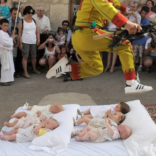 27 Astounding Images From Spain's Centuries-Old Baby Jumping Festival