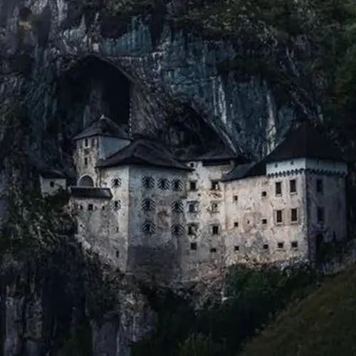 The Wild History Of Predjama Castle, The Medieval Fortress Built Into The Mouth Of A Cave