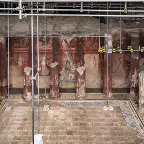 Archaeologists In Pompeii Just Uncovered A Banquet Hall Covered In Stunning Red Frescoes That Depict Religious Rituals