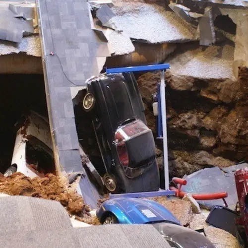 17 Amazing Pictures Of The Sinkhole That Ate $5 Million Worth Of Classic Cars