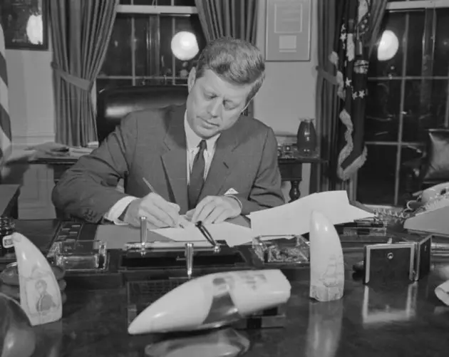 Kennedy Signs Document