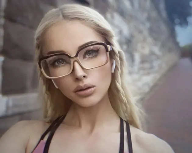 Human Barbie Wearing Glasses