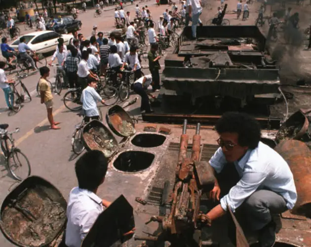 Pro-Democracy Protesters Atop Tank