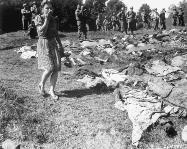 Woman Walking By Bodies WW2 Photos