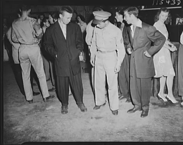Soldier Inspecting Zoot Suits