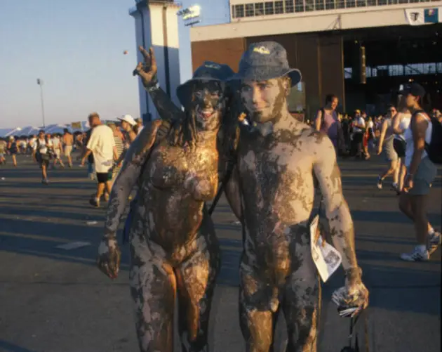 Two Naked Muddy People At Woodstock 99