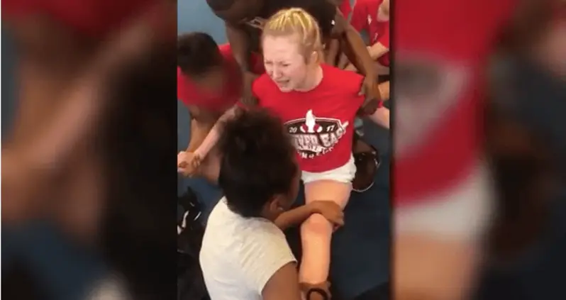 Disturbing Videos Show Cheerleaders Being Forced Into Painful Splits By Coach