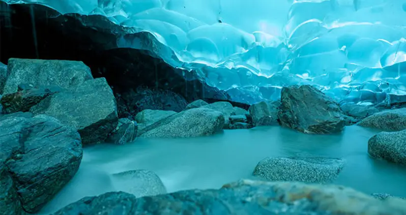 Inside The Otherworldly Mendenhall Ice Caves Of Alaska [PHOTOS]