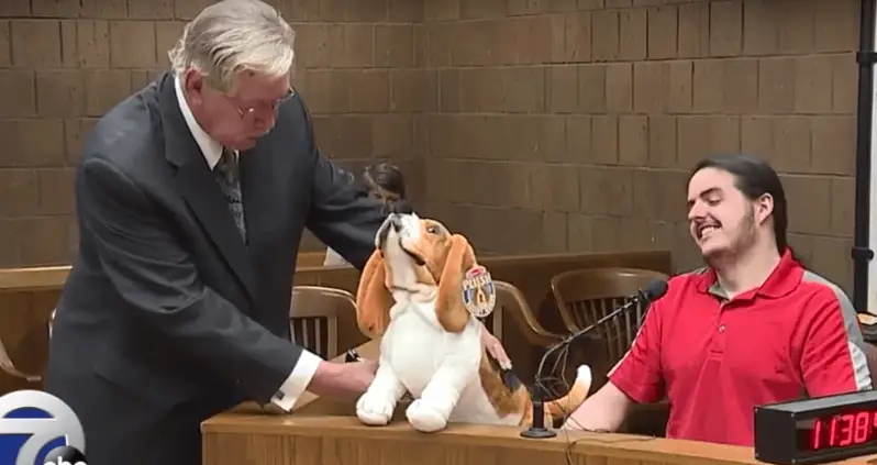 Bestiality Witness Demonstrates What He Saw Using Stuffed Basset Hound [VIDEO]