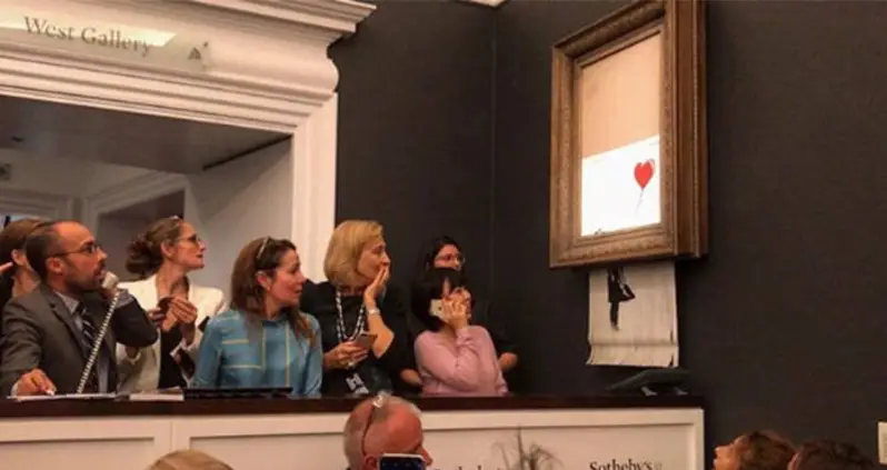 Banksy Painting Self-Destructs Immediately After Being Sold For $1.4 Million