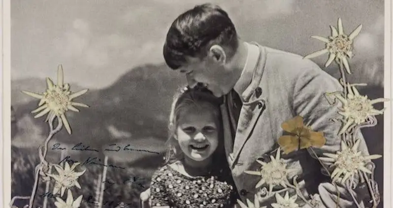 A Signed Photo Of Hitler Embracing A Little Jewish Girl Just Sold For Over $11,000