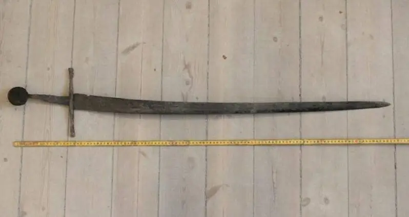 Medieval Sword Pulled Out Of Danish Sewer With Its Blade Still Intact