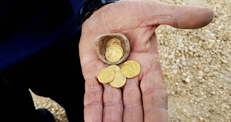 Archaeologists In Israel Discovered A 1,200-Year-Old Piggy Bank Of Gold Coins Just In Time For Hanukkah