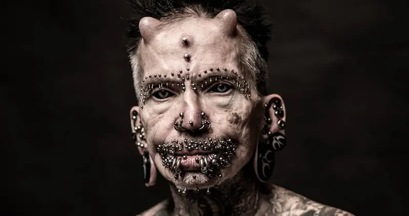 Meet Rolf Buchholz, The 60-Year-Old Man With The Most Body Modifications In The World