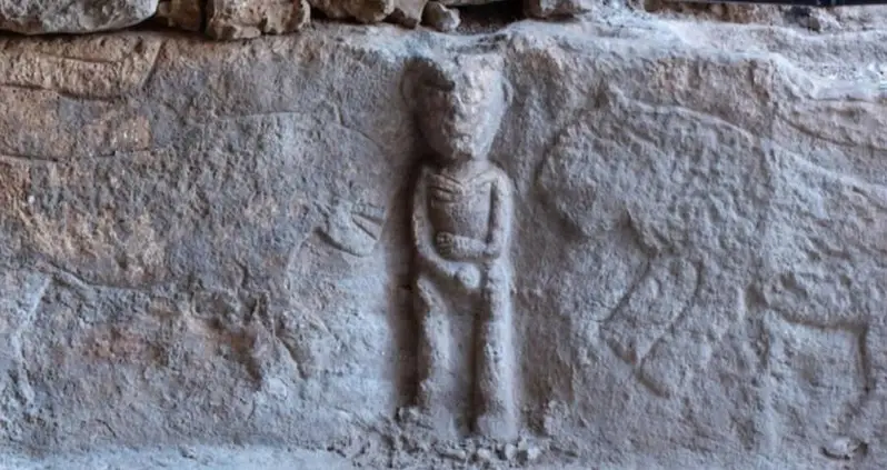 Archaeologists Discover The World’s Earliest Narrative Carving — And It’s A Man Holding His Penis Surrounded By Leopards