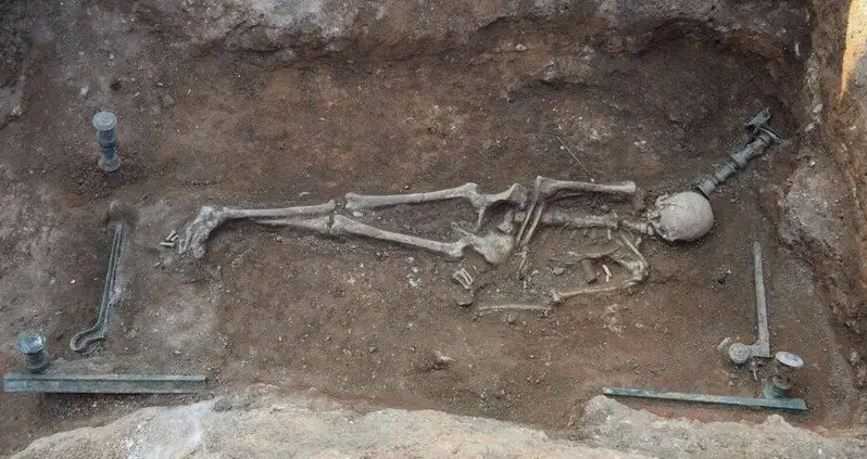 Archaeologists In Greece Unearth A 2,100-Year-Old Skeleton Buried On A Bronze Bed Decorated With Mermaids