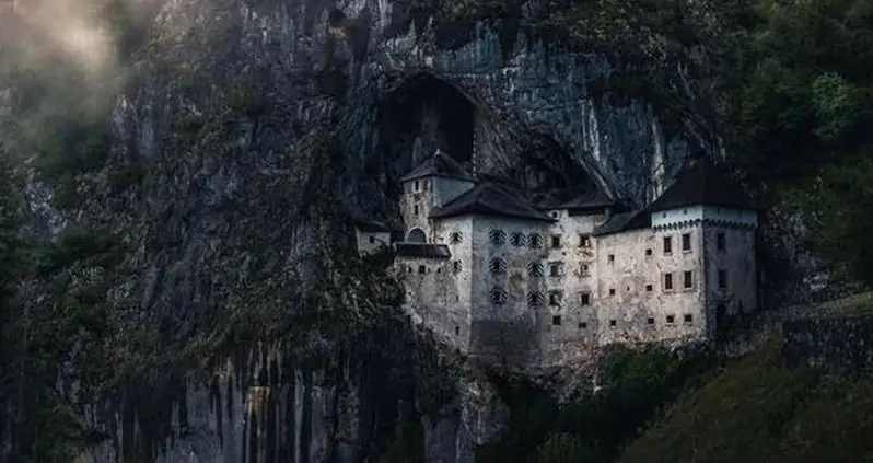 The Wild History Of Predjama Castle, The Medieval Fortress Built Into The Mouth Of A Cave