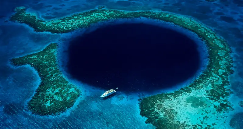Exploring Belize’s Great Blue Hole, The Massive Underwater Sinkhole That’s Visible From Space