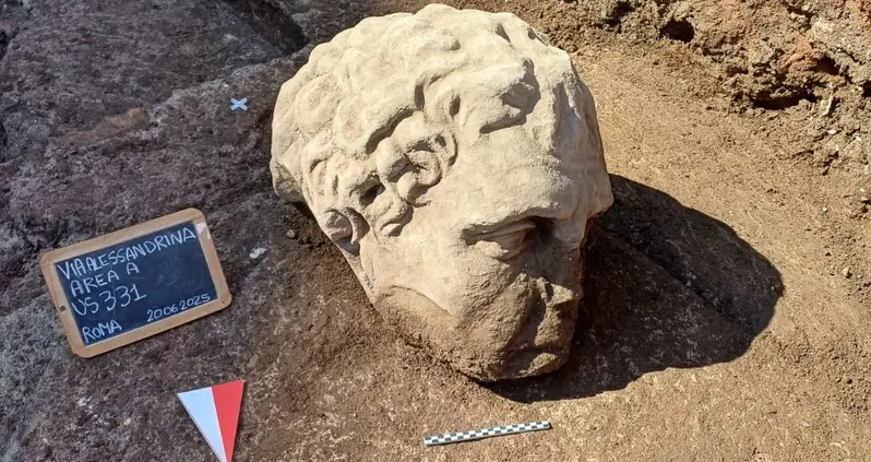 ‘Rome Never Ceases To Amaze’: A Colossal Statue Head Was Just Unearthed Near Trajan’s Forum