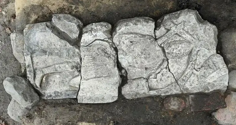 Archaeologists In Poland Just Uncovered A 700-Year-Old Tombstone Depicting A Medieval Knight