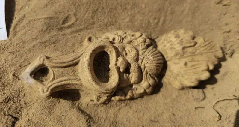 This 1,900-Year-Old Roman Oil Lamp Shaped Like A Theatrical Mask Was Just Unearthed In The Netherlands