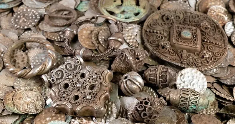 A Fisherman In Sweden Stumbled Upon A Cauldron Filled With 20,000 Medieval Coins While Digging For Worms