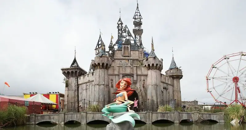 Banksy Blasts Hollywood, Disney In Latest Prank Installation, “Dismaland”