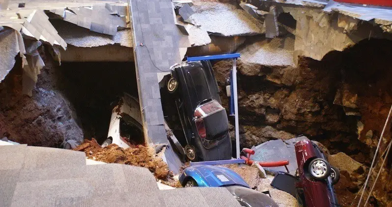 17 Amazing Pictures Of The Sinkhole That Ate $5 Million Worth Of Classic Cars