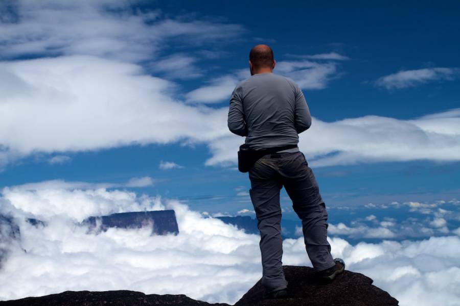 Man Looking At Clouds