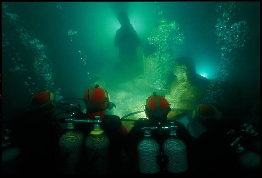 Divers Observing Underwater Alexandria