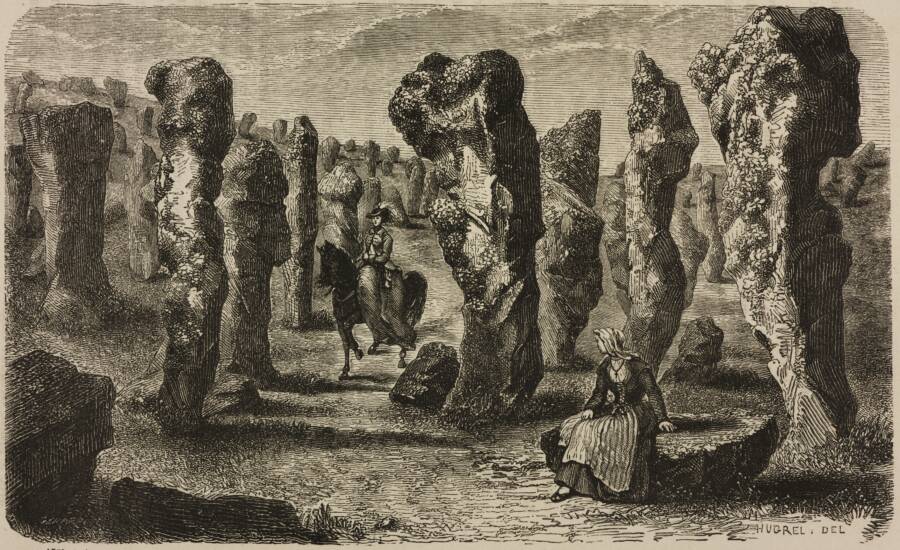 Woman Sitting Among The Carnac Stones