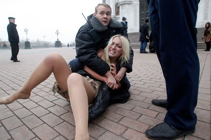 Bizarre Protests Girl Restrained