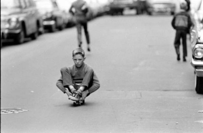 Skateboarding Kids Sitting