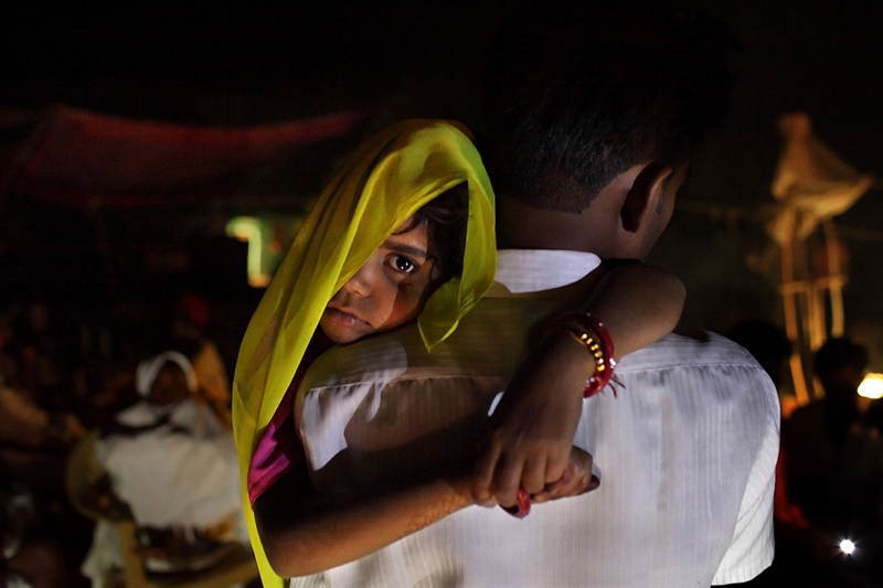 India Man Carrying Bride