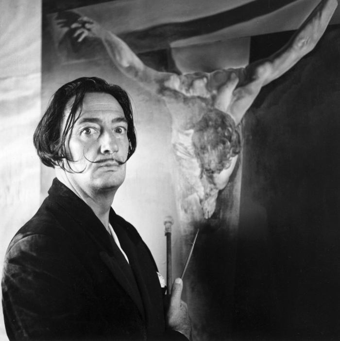 Salvador Dali In Front Of A Crucifixion