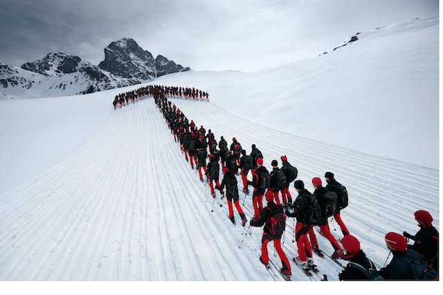 Climbers form an arrow on the Matterhorn.