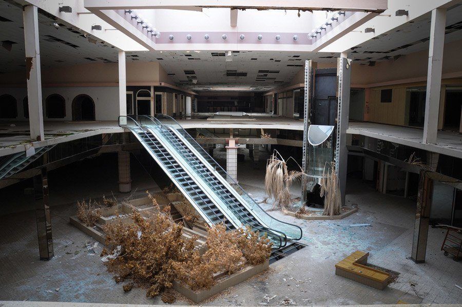 Abandoned Mall With Dark Stores