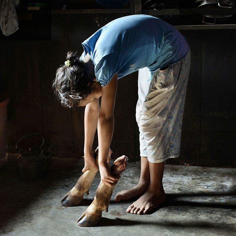 Khasi Girl Plays with Hoof