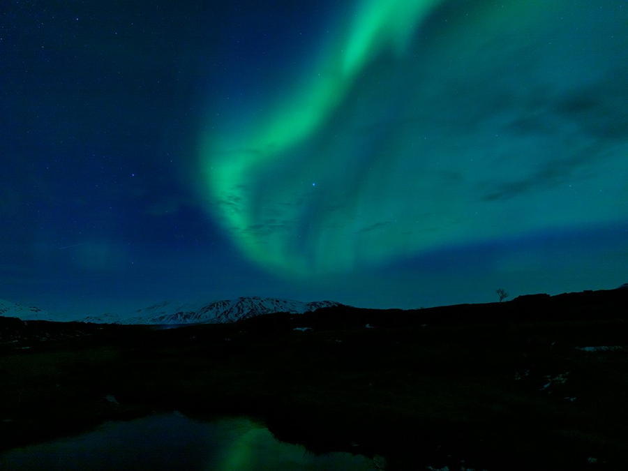Aurora Green Snowy Mountains