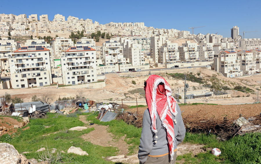 A Palestinian Looks At The Israeli Settlement Har Homa In The West Bank