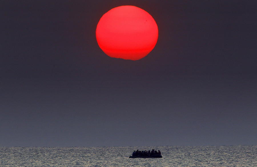 Migrant Boat Red Sun